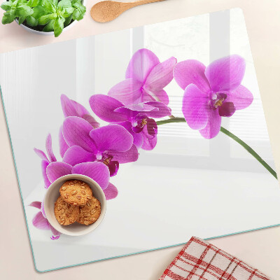 Glasschneidebrett Orchideenblüten in Rosatönen