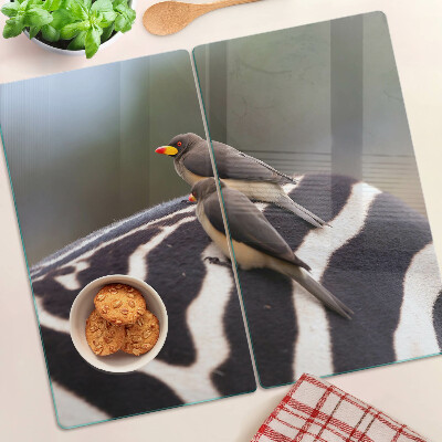 Glasschneidebrett Vögel auf einem Zebra