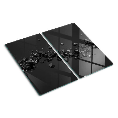 Glasschneidebrett Schwarze Kristalle auf dem Hintergrund