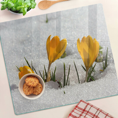 Schneidebrett glas Krokusse im Schnee