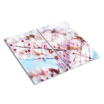Glasschneidebrett Kirschblüten auf blauem Hintergrund