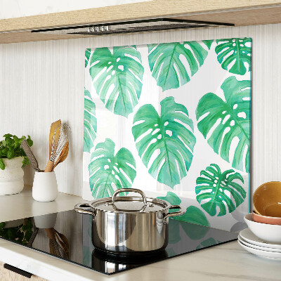 Glasschneidebrett Monstera-Blätter auf weißem Hintergrund