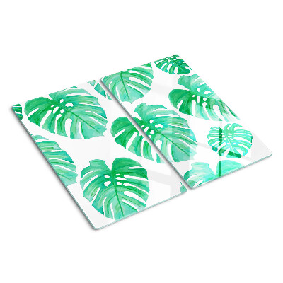 Glasschneidebrett Monstera-Blätter auf weißem Hintergrund