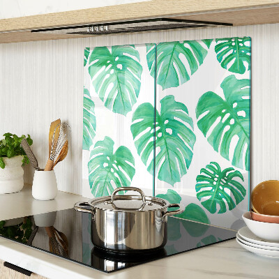 Glasschneidebrett Monstera-Blätter auf weißem Hintergrund