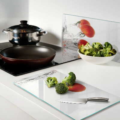 Glasschneidebrett Tomaten in Wasser