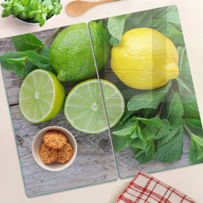 Schneidebrett glas Zitronen und Limetten mit Minze