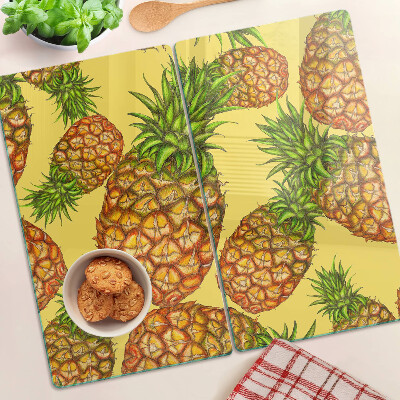 Glasschneidebrett Ananas auf gelbem Hintergrund