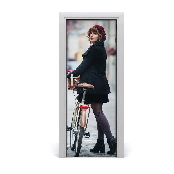 Selbstklebendes wandbild an der wand Frau auf fahrrad