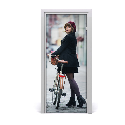 Selbstklebendes wandbild an der wand Frau auf fahrrad