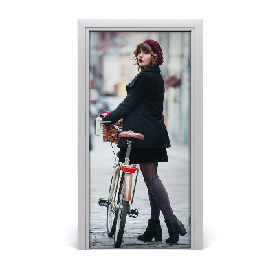 Selbstklebendes wandbild an der wand Frau auf fahrrad