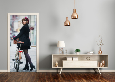 Selbstklebendes wandbild an der wand Frau auf fahrrad