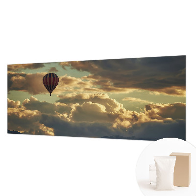 Fototapete mit einem Heißluftballon in den Wolken