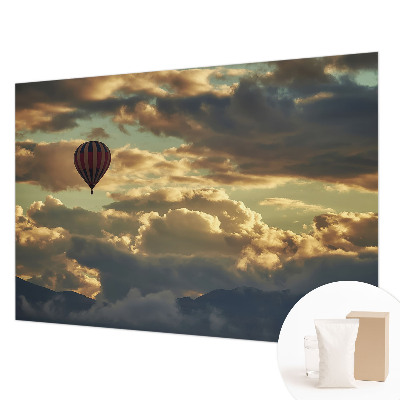 Fototapete mit einem Heißluftballon in den Wolken