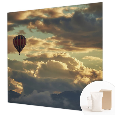 Fototapete mit einem Heißluftballon in den Wolken