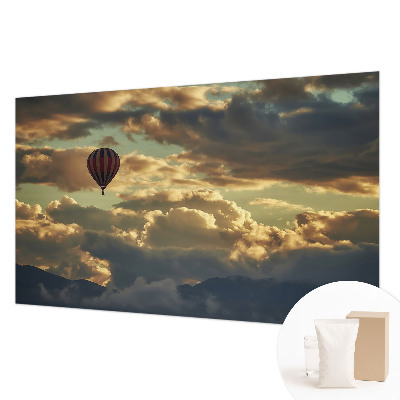 Fototapete mit einem Heißluftballon in den Wolken