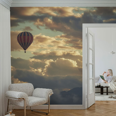 Fototapete mit einem Heißluftballon in den Wolken