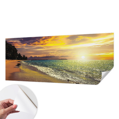 Selbstklebende Fototapete fürs Wohnzimmer mit Motiv eines Strandes bei Sonnenuntergang