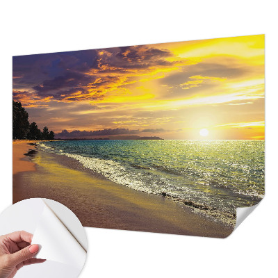 Selbstklebende Fototapete fürs Wohnzimmer mit Motiv eines Strandes bei Sonnenuntergang