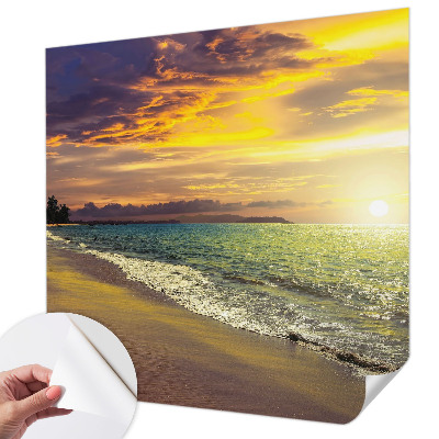 Selbstklebende Fototapete fürs Wohnzimmer mit Motiv eines Strandes bei Sonnenuntergang