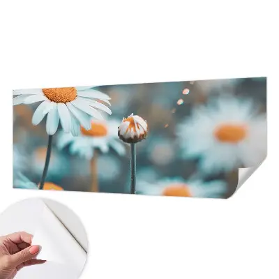 Selbstklebende Fototapete fürs Kinderzimmer mit Motiv einer Kamillenblüte in warmen Farben