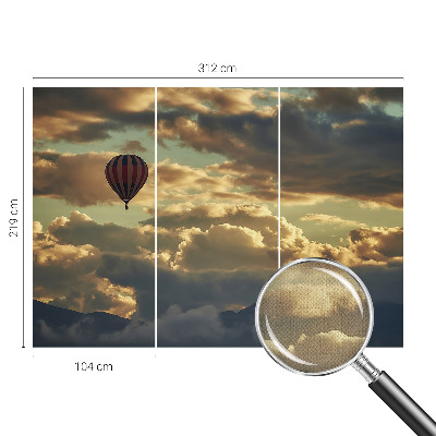 Motivtapete fürs Wohnzimmer mit einem Motiv aus Ballons zwischen den Wolken