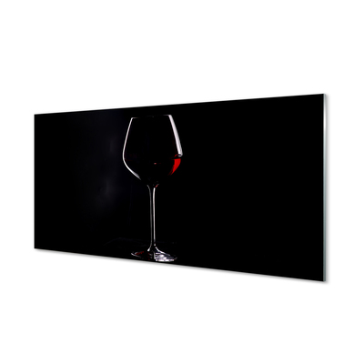 Acrylglasbilder Schwarzer hintergrund mit einem glas wein