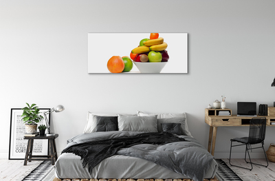 Leinwandbilder Obst in eine Schüssel geben