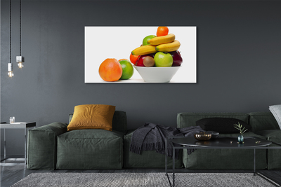 Leinwandbilder Obst in eine Schüssel geben