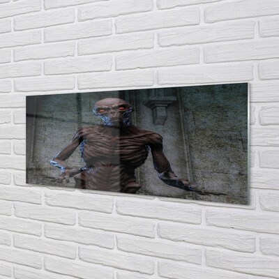 Glasbilder Die schreckliche figur im gebäude
