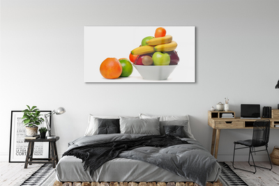 Glasbilder Obst in eine schüssel geben