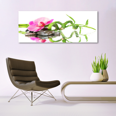 Glasbild aus Plexiglas® Bambusrohr Blume Steine Kunst