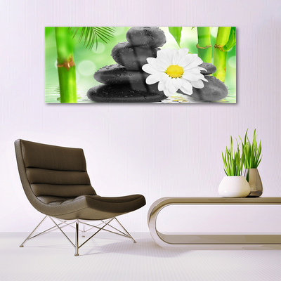 Glasbild aus Plexiglas® Bambusrohre Blume Steine Kunst