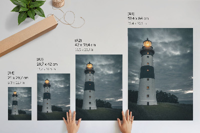 Kunstdruck leinwand Ein Leuchtturm vor einem bewölkten Himmel