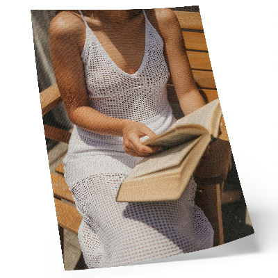 Kunstdruck leinwand Frau mit einem Buch, Holzbank, Sonne
