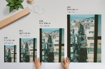 Wandposter Moderne Stadtlandschaft mit Bergen
