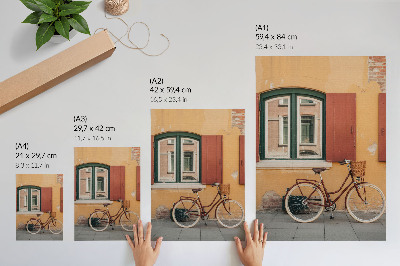 Kunstdruck leinwand Ein Fahrrad vor dem Hintergrund einer farbenfrohen Retro-Fassade