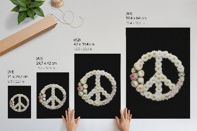 Poster Blumen in Form eines Friedenssymbols auf schwarzem Hintergrund