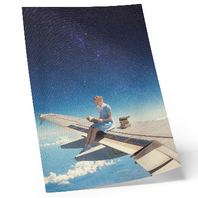 Wandposter Mädchen auf dem Flügel eines Flugzeugs – Universum-Bücher