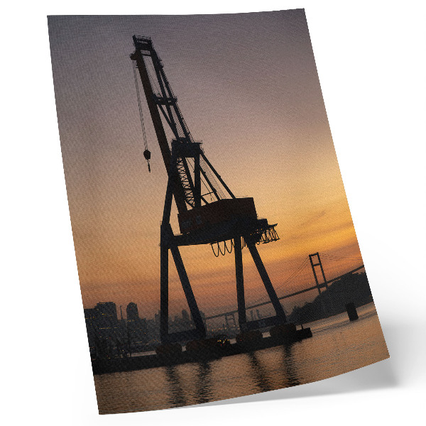 Poster Silhouette eines Industriekrans bei Sonnenuntergang Brücke
