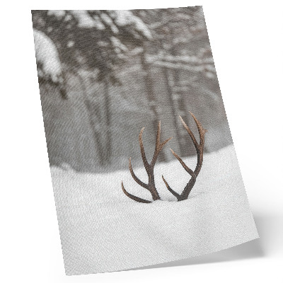 Wandposter Winterlandschaft mit Geweihen im Schnee