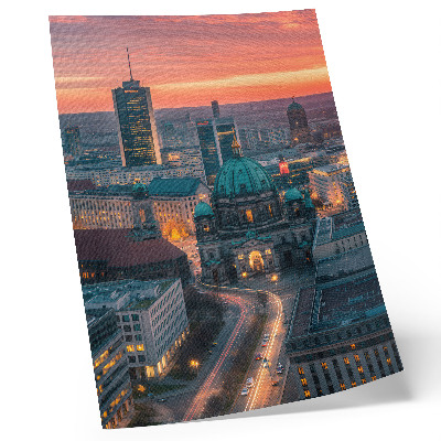 Poster Moderne Stadt am Abend in warmem Licht