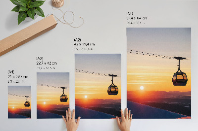Poster Seilbahnfahrt bei Sonnenuntergang in den Bergen
