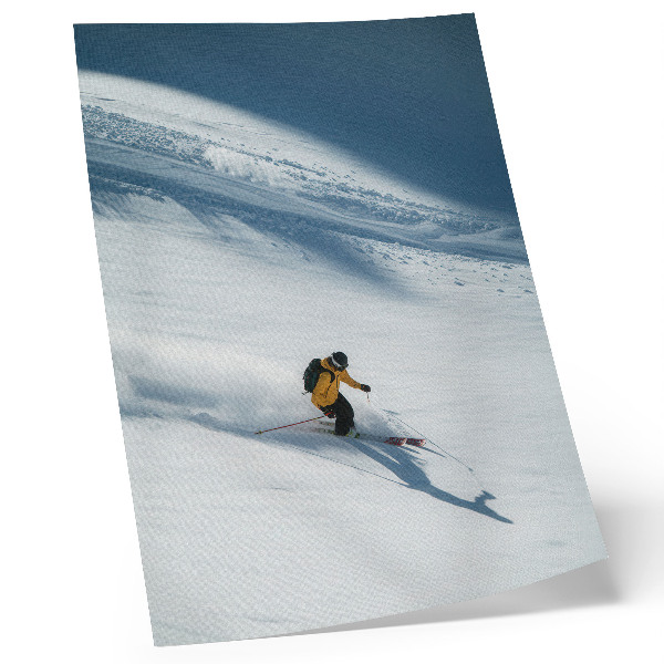 Kunstdruck leinwand Skifahrer gelbe Jacke Schneehang Schatten