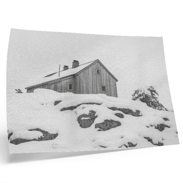 Poster Ein minimalistisches Winterhaus vor der Kulisse von Schnee