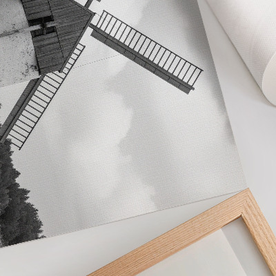 Poster Eine schwarz-weiße Windmühle auf einem Feld mit Pferden