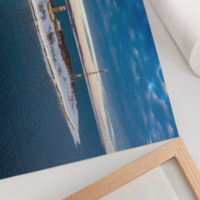 Kunstdruck poster Winterinsel mit Leuchtturm und blauem Meer