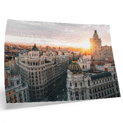 Poster Eine abendliche Stadt mit majestätischer Architektur