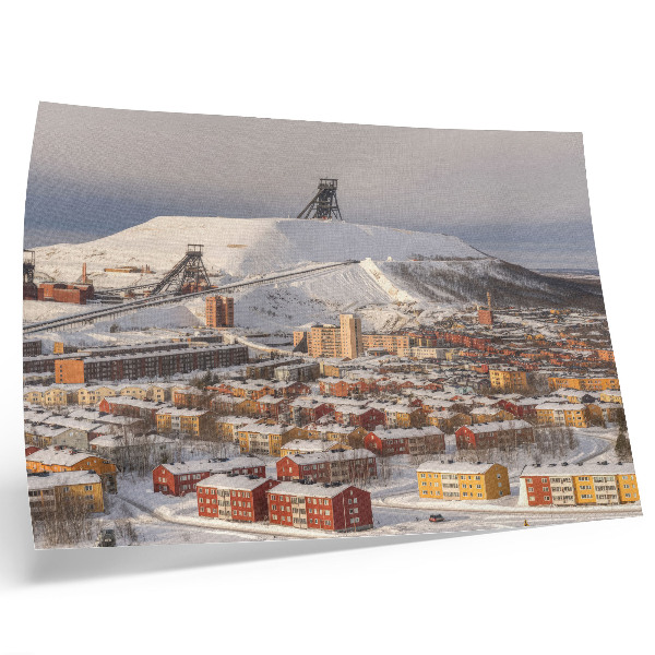 Poster Winterstadt mit farbenfrohen Gebäuden, die einen Kontrast zum Schnee bilden