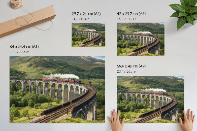 Kunstdruck poster Ein Viadukt mit einem Zug inmitten grüner Hügel