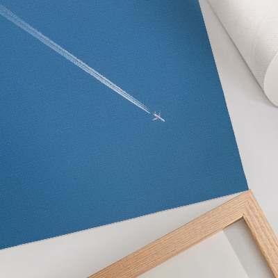 Poster kunstdruck Flugzeug vor blauem Himmel, dynamische Atmosphäre